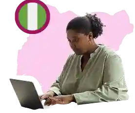 Nigerian woman typing on a laptop